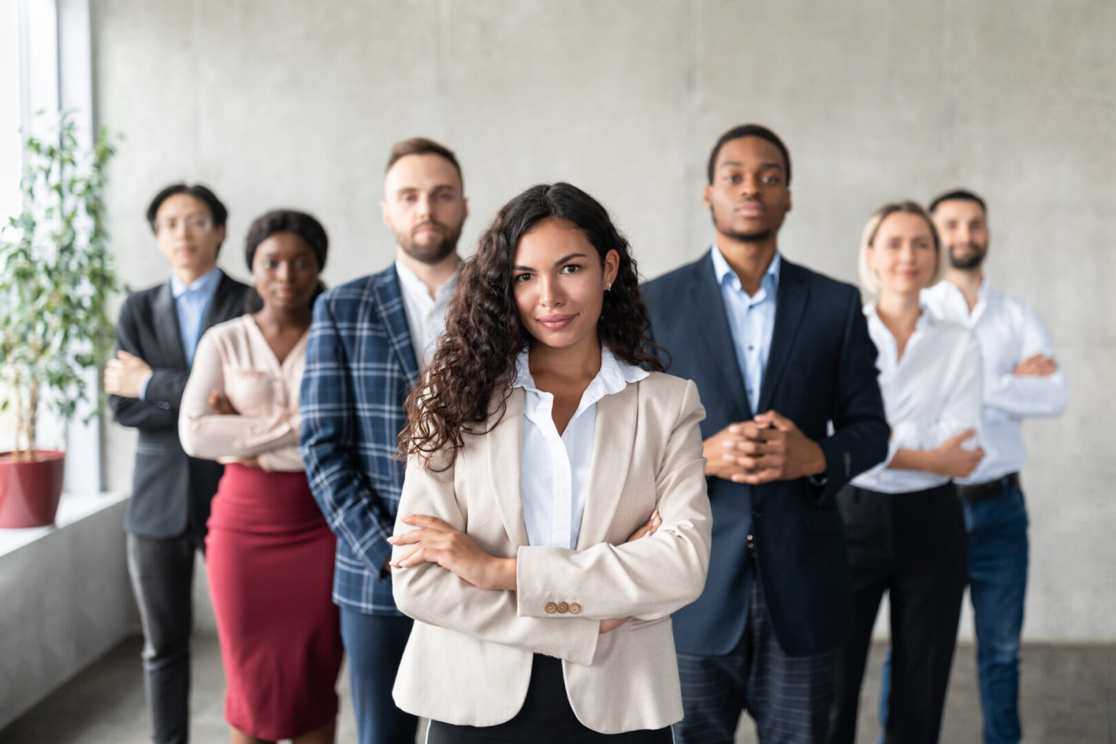 A group of people standing in front of each other.