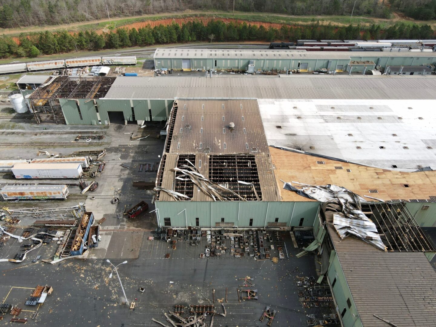 An aerial view of a building that is being demolished.